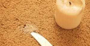 از بین بردن لکه شمع از روی فرش